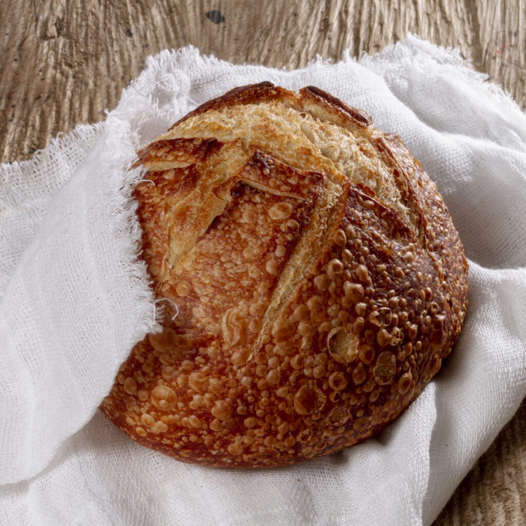 baked bread wrapped cloth
