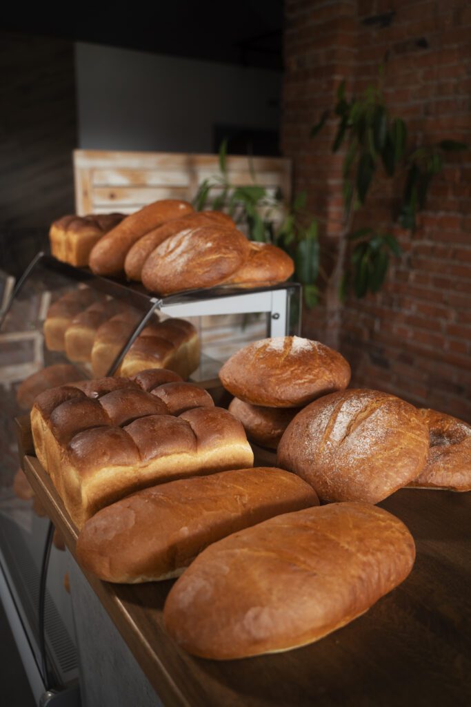 view delicious baked bread pastry shop (1)
